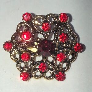 Elegant Aged Gold Tone and Red Rhinestone Brooch